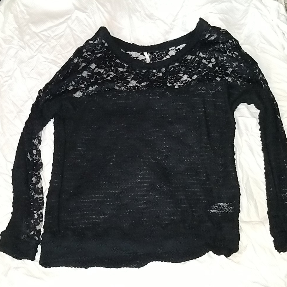 Black semi sheer blouse.